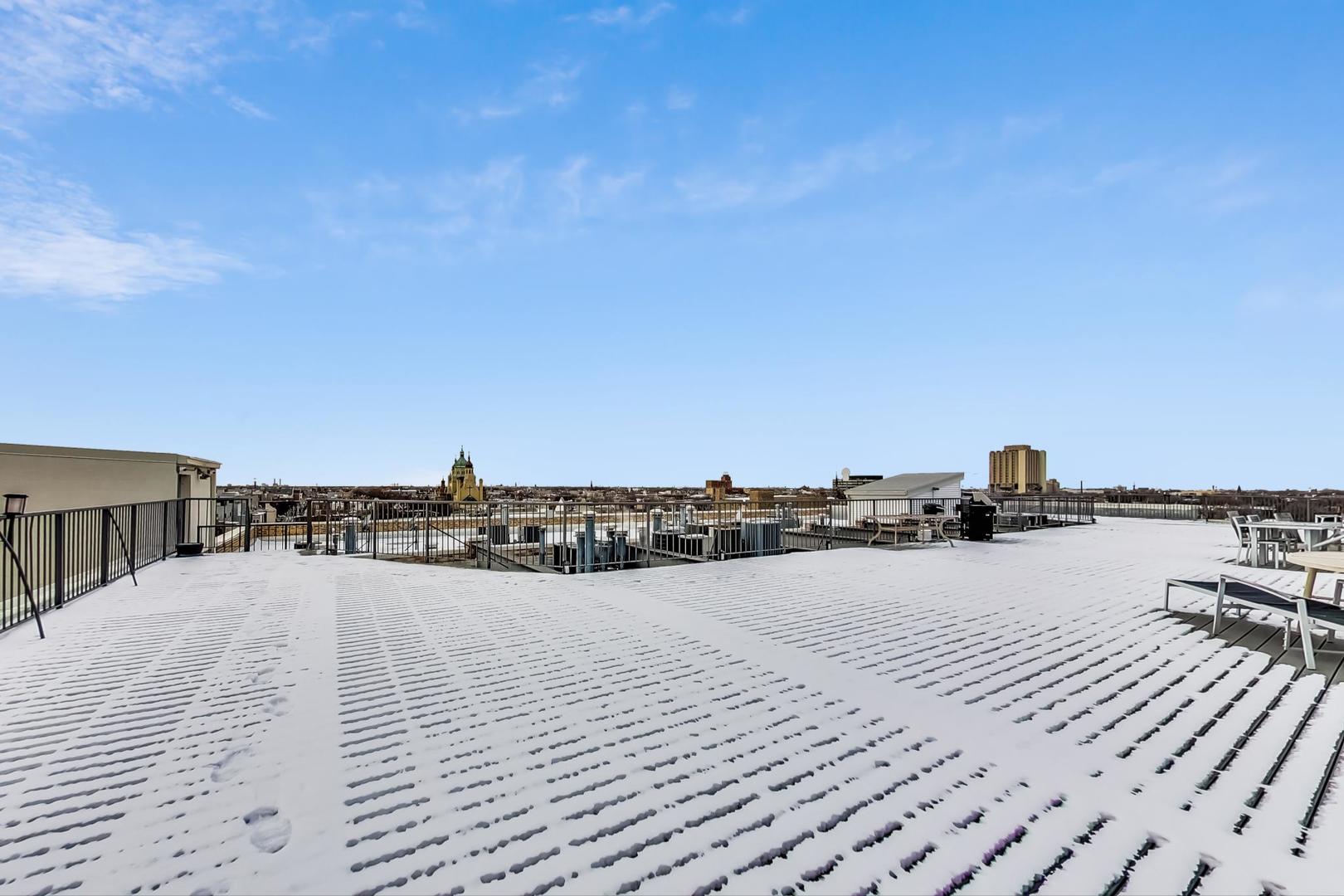 2101 West Rice Street, Unit 103 Chicago, IL 60622 - Photo 35 of 44 a view of a terrace with city view