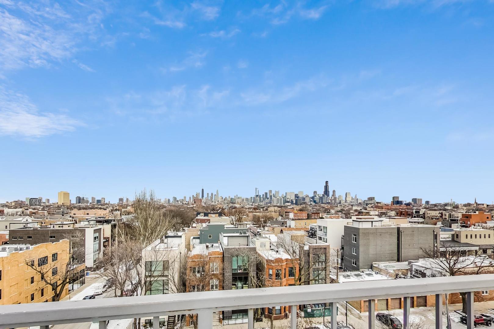 2101 West Rice Street, Unit 103 Chicago, IL 60622 - Photo 40 of 44 a view of a city with tall buildings