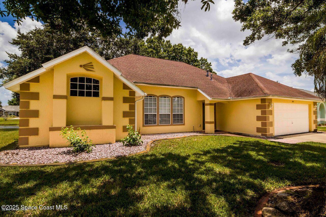 2091 Lionel Drive Melbourne, FL 32940 - Photo 1 of 17 Front of home