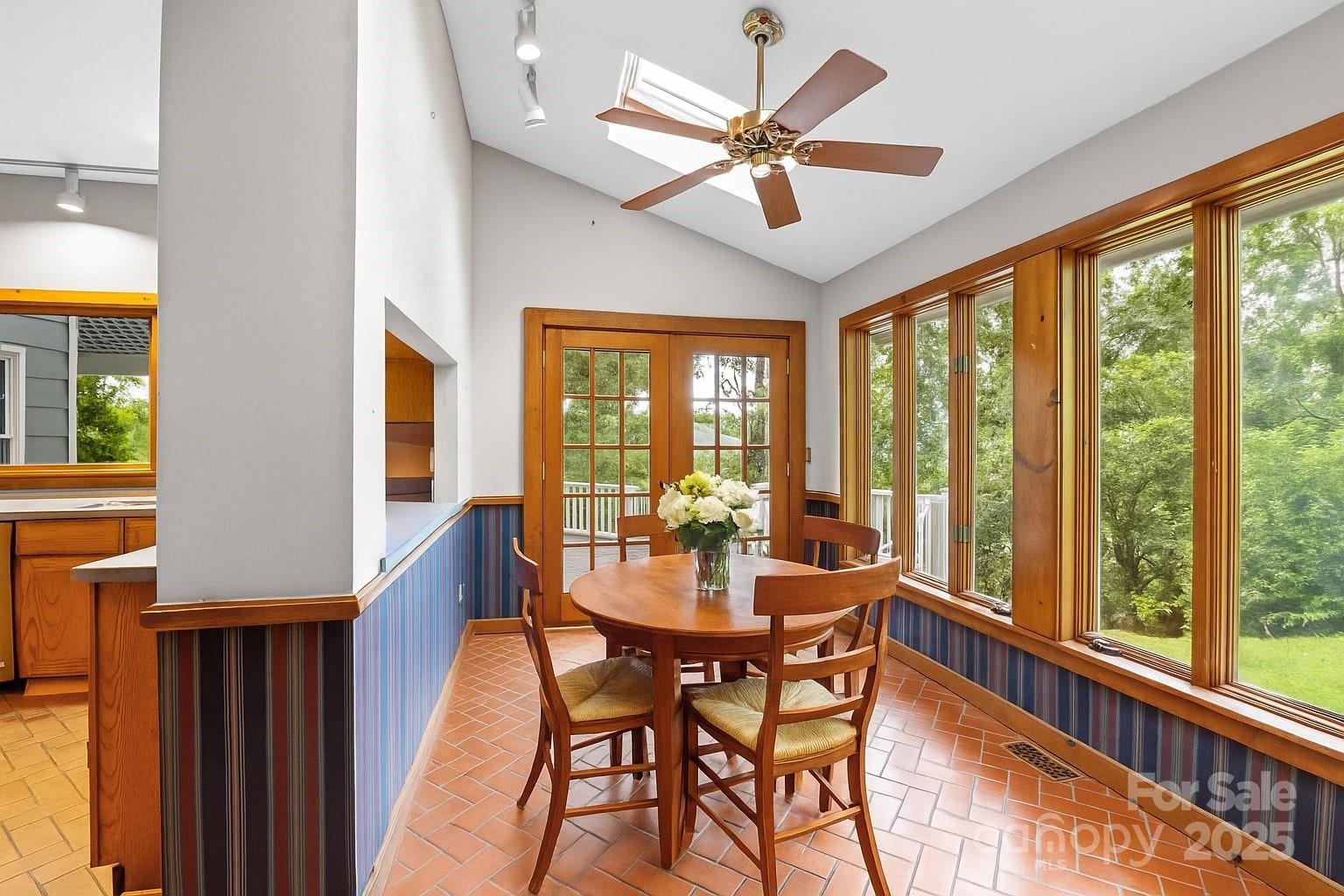 32 Delano Road Asheville, NC 28805 - Photo 12 of 46 a view of a dining room with furniture window and outside view