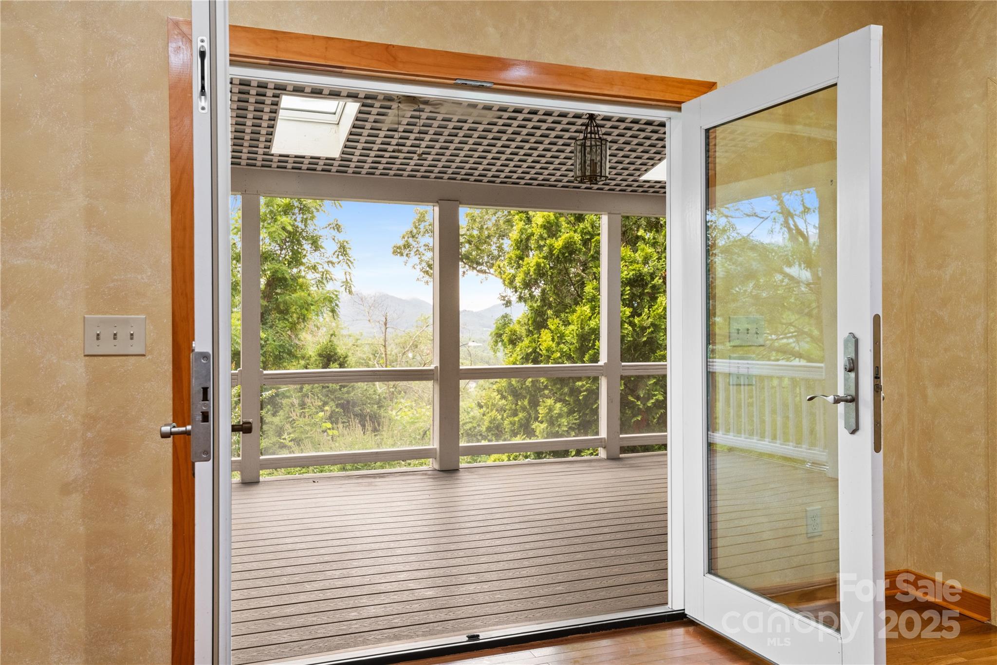 32 Delano Road Asheville, NC 28805 - Photo 21 of 46 a view of a glass door with a glass door