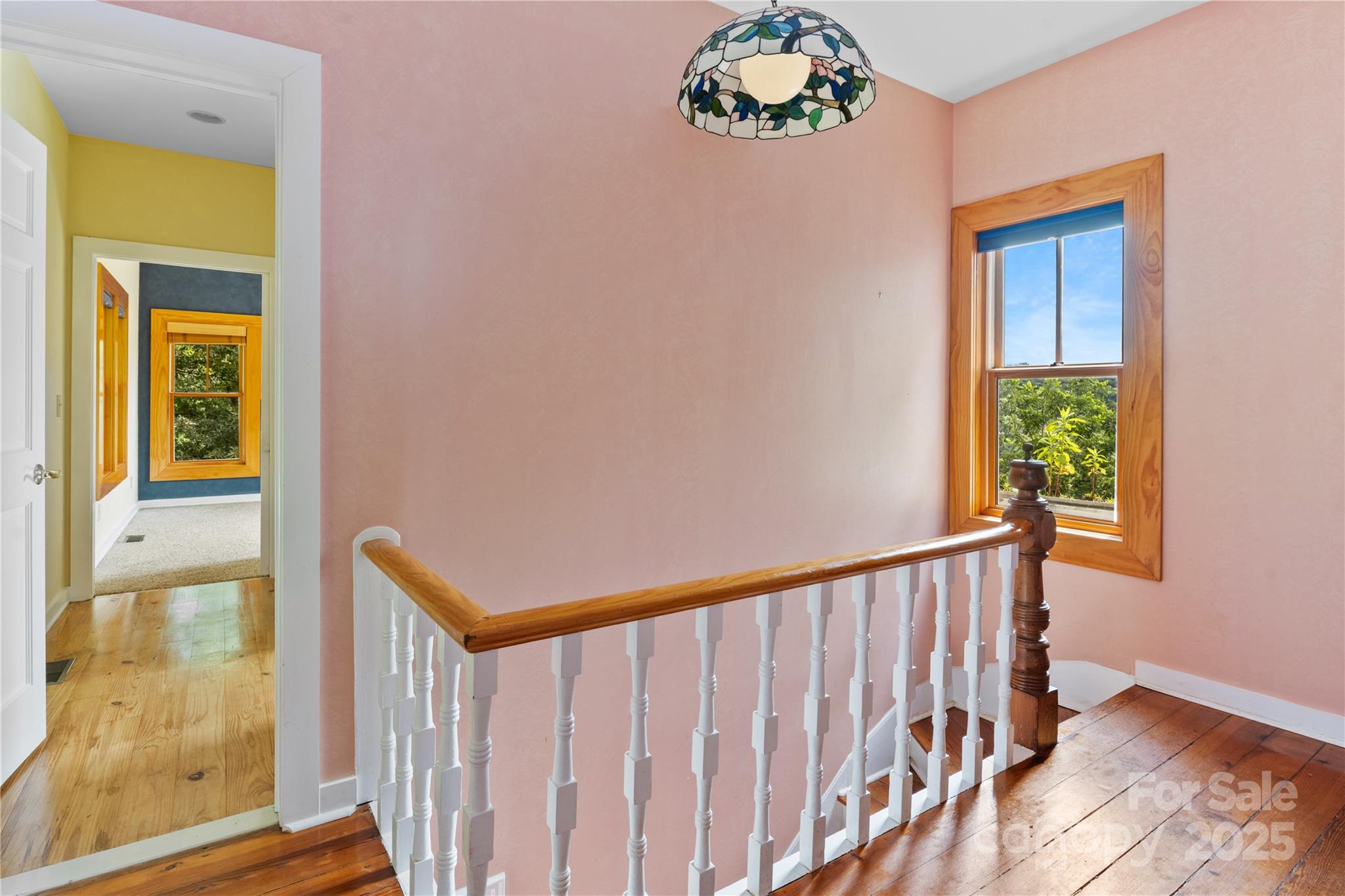 32 Delano Road Asheville, NC 28805 - Photo 33 of 46 a view of a hallway with wooden floor and a window
