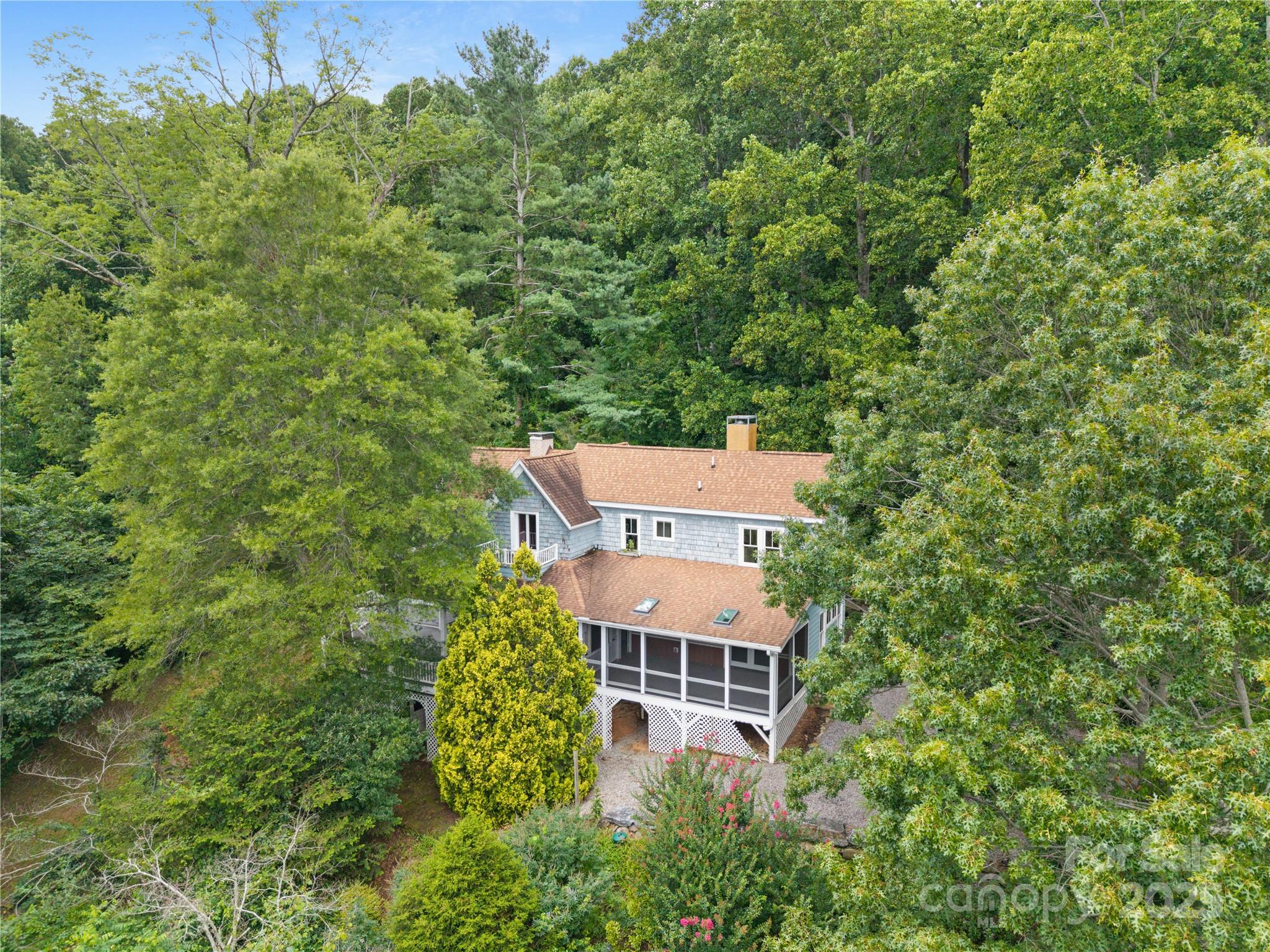 32 Delano Road Asheville, NC 28805 - Photo 46 of 46 an aerial view of a house with a yard
