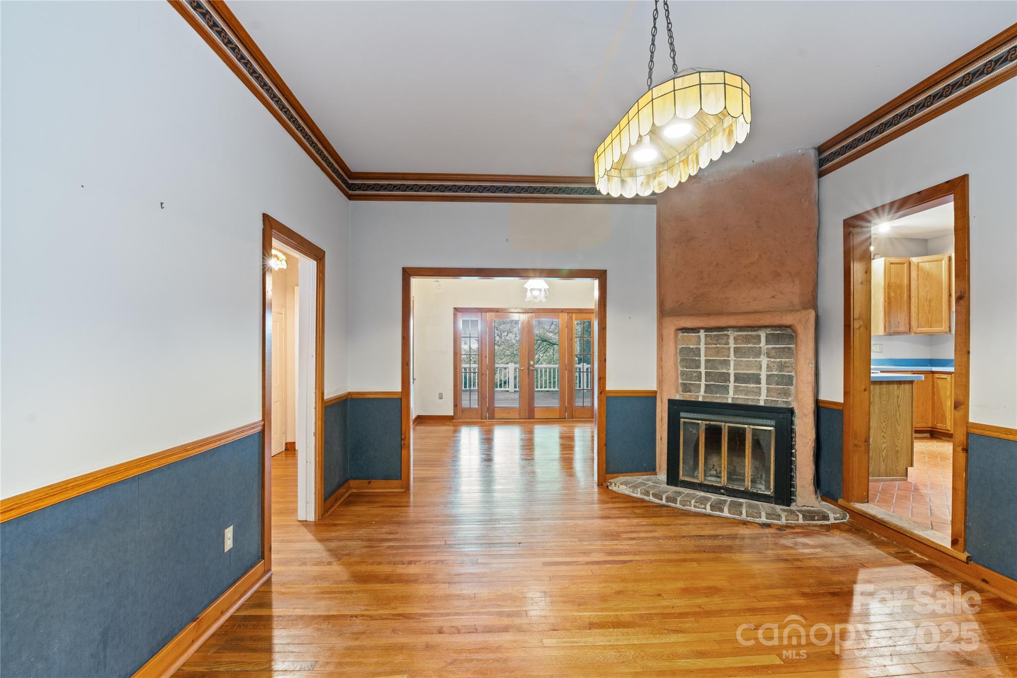 32 Delano Road Asheville, NC 28805 - Photo 5 of 46 wooden floor in an empty room with a window
