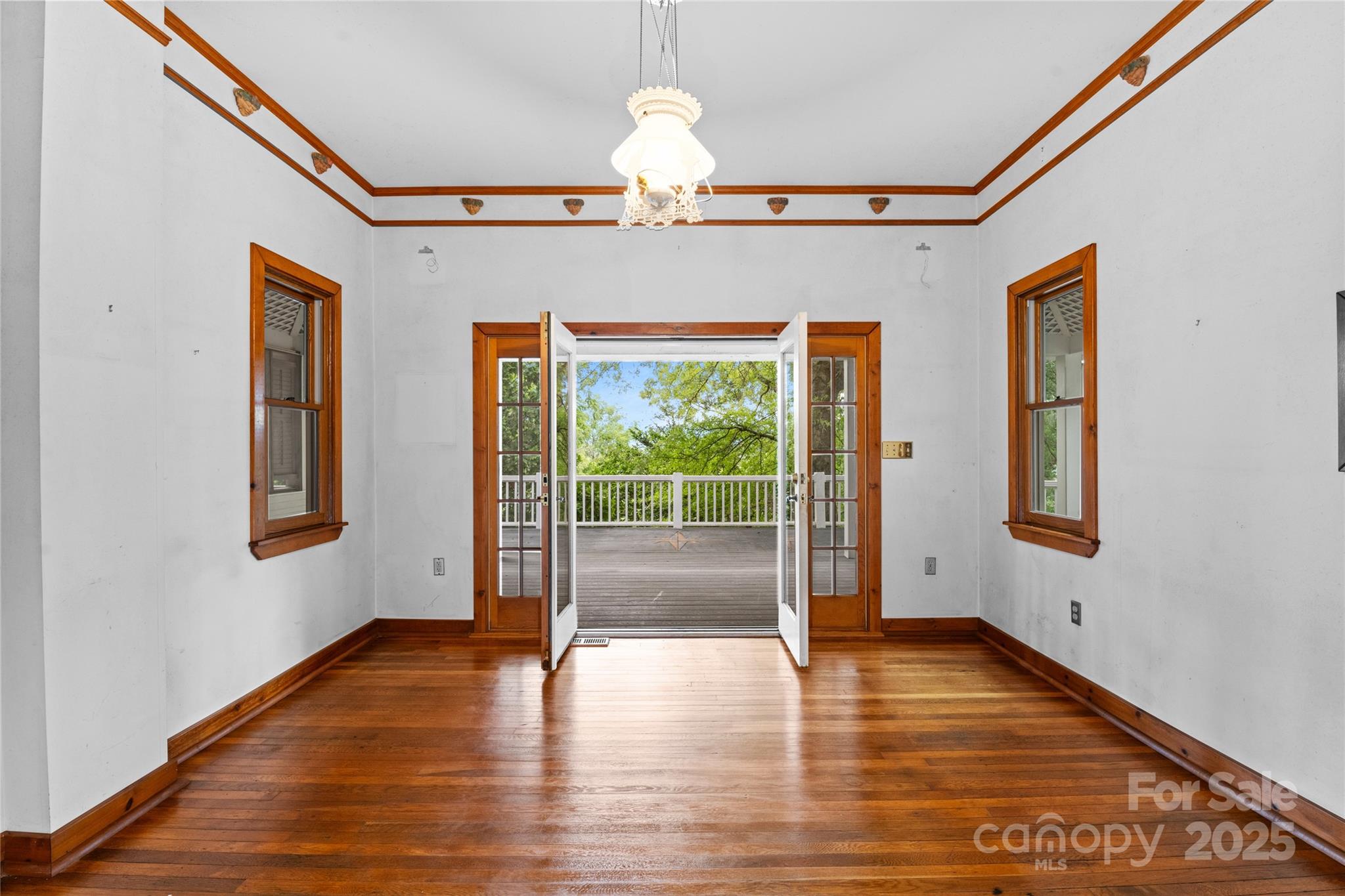 32 Delano Road Asheville, NC 28805 - Photo 7 of 46 a view of empty room with wooden floor and fan