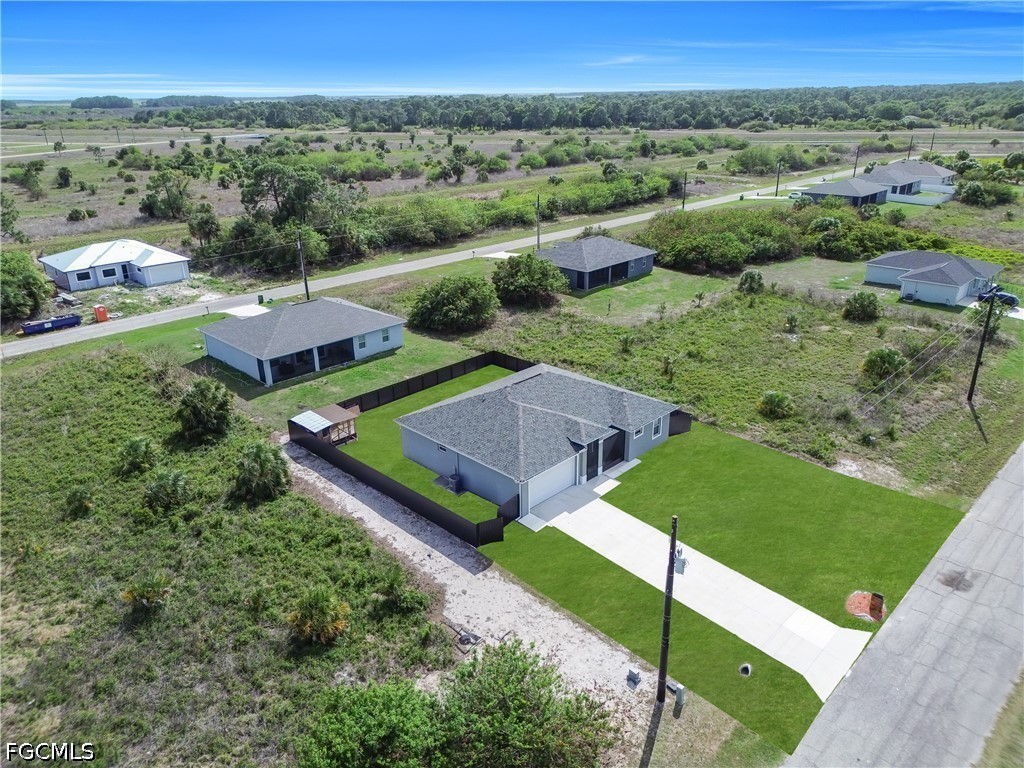 384 Neighborly Road LaBelle, FL 33935 - Photo 41 of 45 an aerial view of a house with a garden