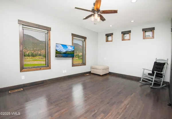 a kitchen with stainless steel appliances granite countertop a stove and a microwave