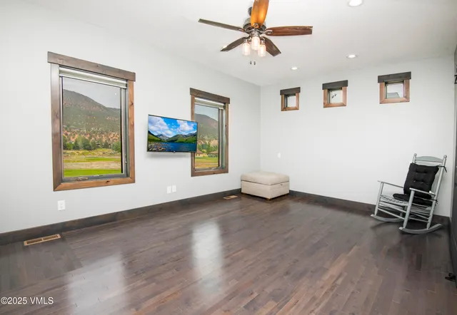 a kitchen with stainless steel appliances granite countertop a stove and a microwave