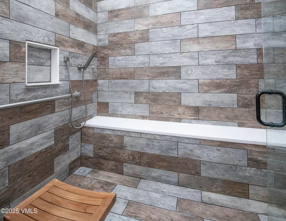 a view of an entryway with wooden floor and stairs