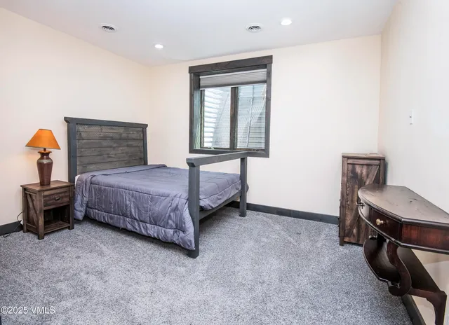 a balcony with furniture and wooden floor