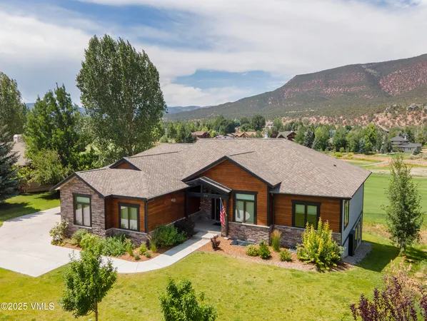 a view of a swimming pool with a garden