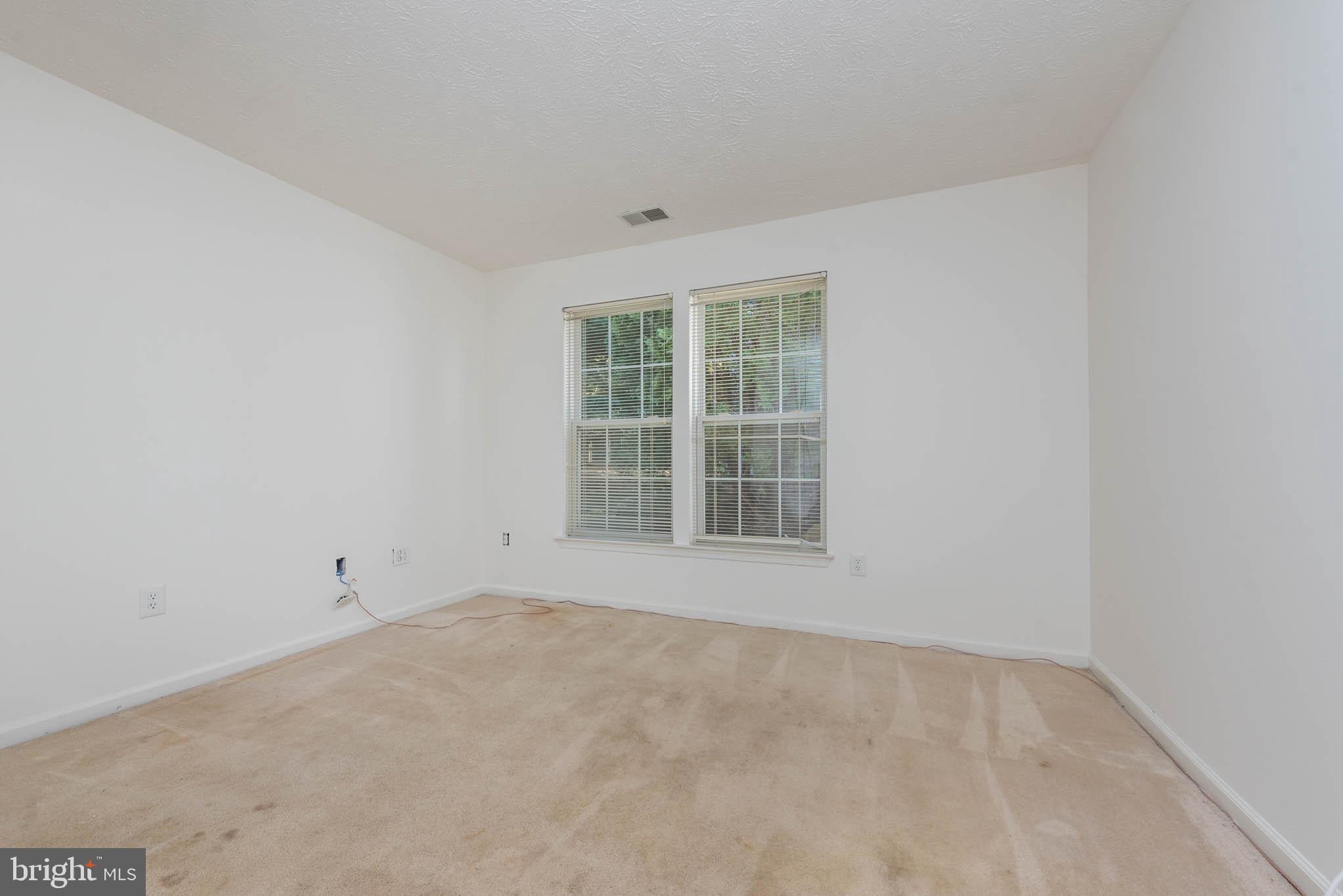 9715 Reese Farm Road, Unit 9715 Owings Mills, MD 21117 - Photo 12 of 25 an empty room with a window
