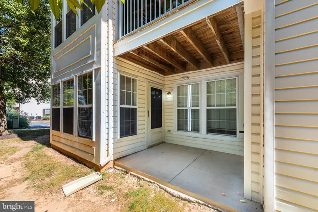 a view of a balcony with door
