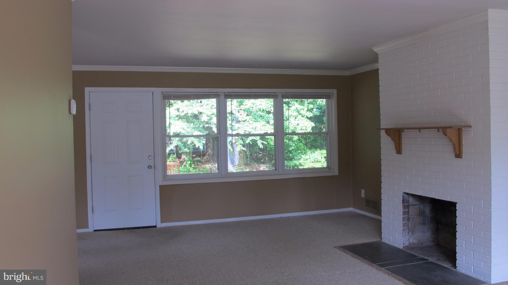 7543 Axton Street Springfield, VA 22151 - Photo 5 of 13 Family Room with Fireplace