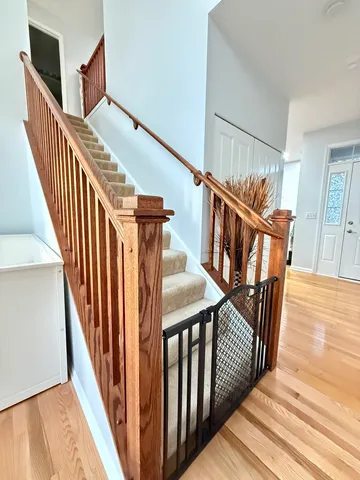 a view of entryway with wooden floor