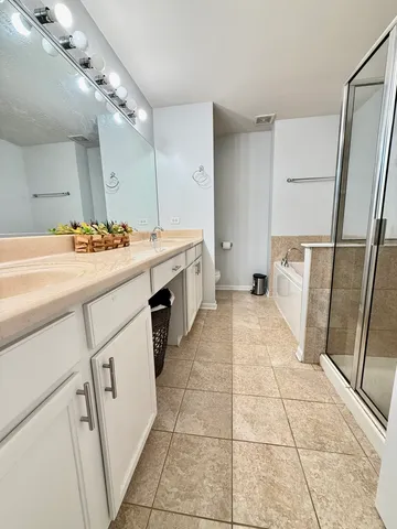 a kitchen with a stove a sink and a refrigerator