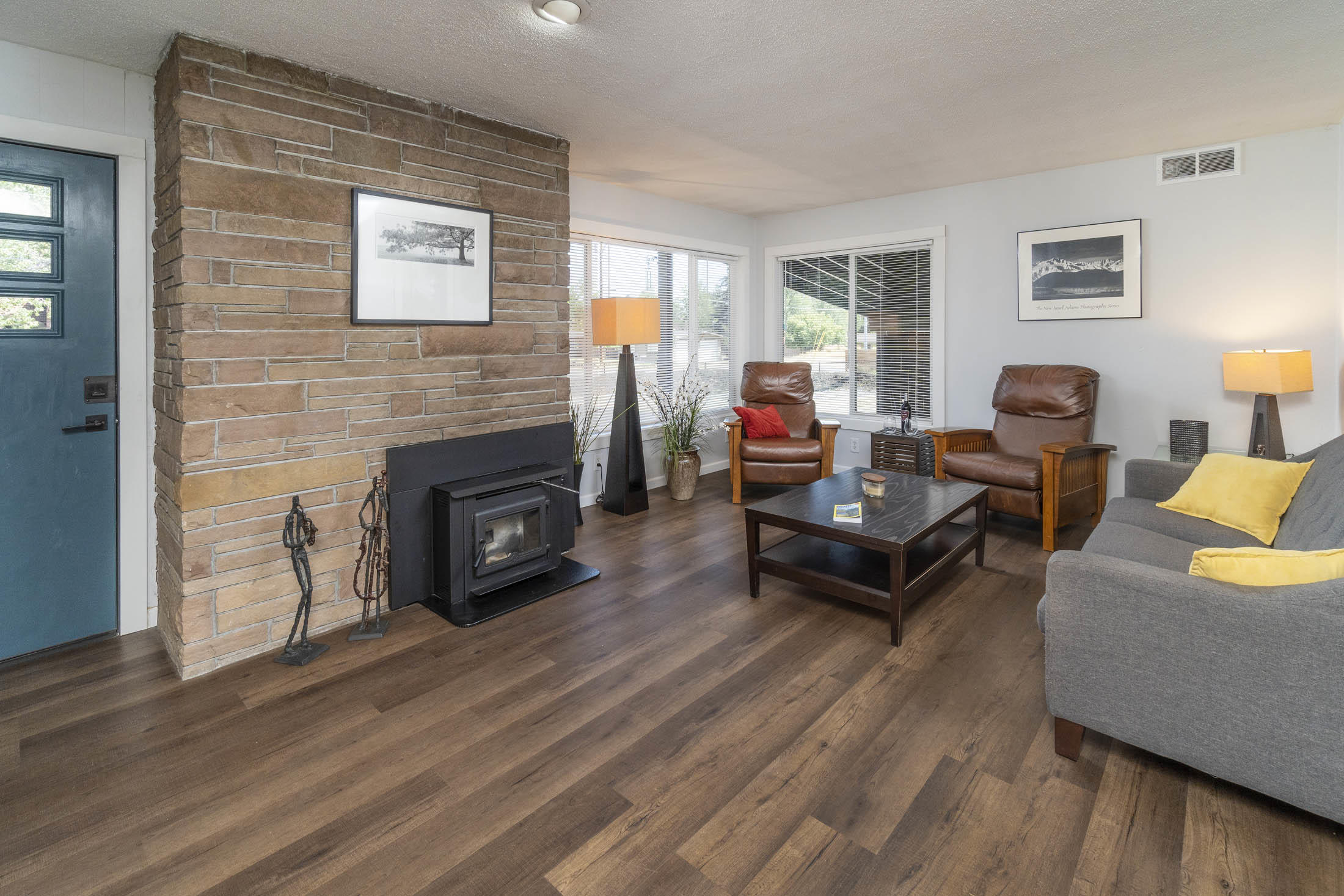 61139 Parrell Road Bend, OR 97702 - Photo 5 of 16 Beautiful stone fireplace with NEW TrueNorth Pellet Stove