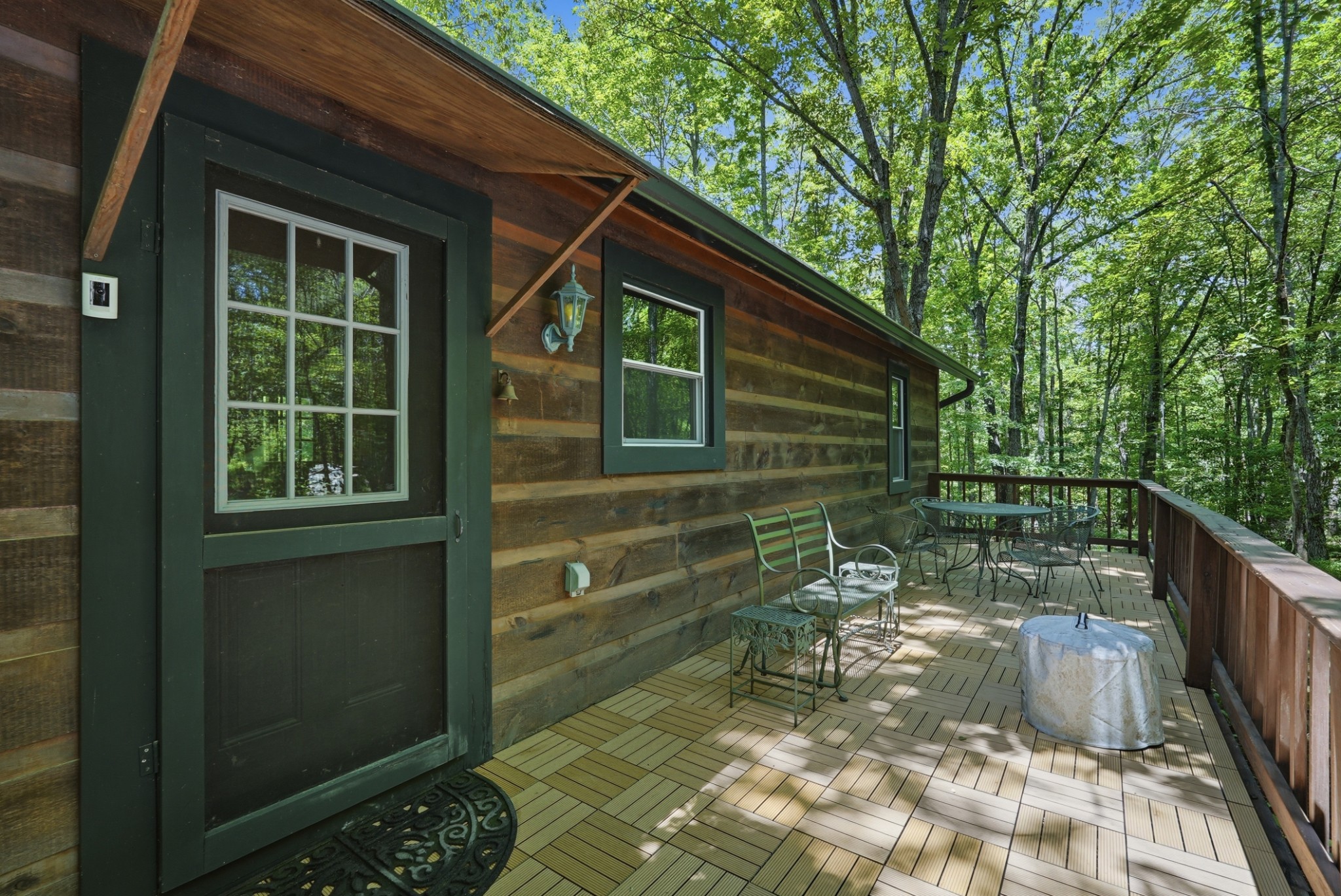 118 Cherokee Road Spencer, TN 38585 - Photo 23 of 85 a backyard of a house with seating space