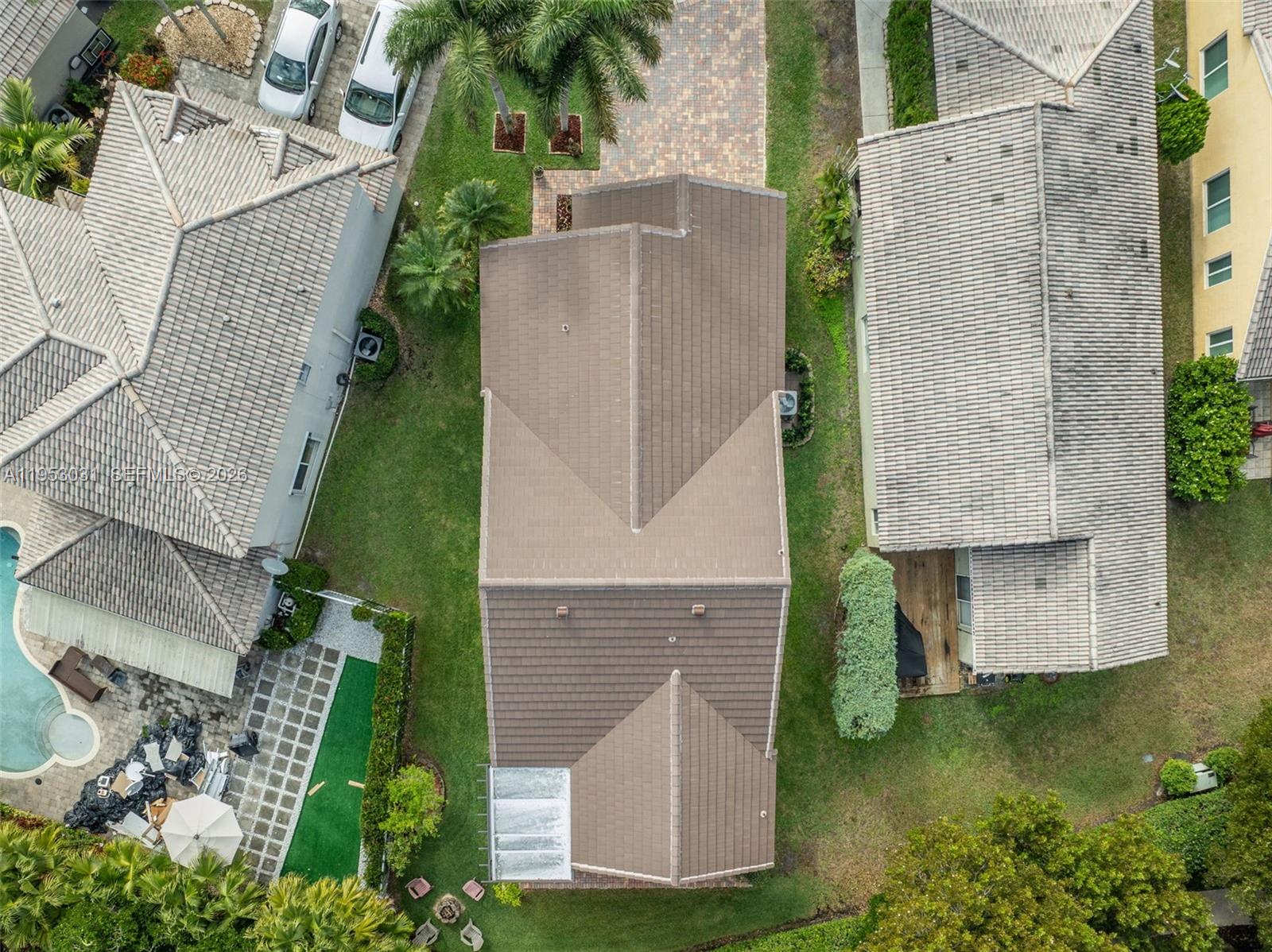 4036 Pine Ridge Lane Weston, FL 33331 - Photo 18 of 19 an aerial view of a house with a yard