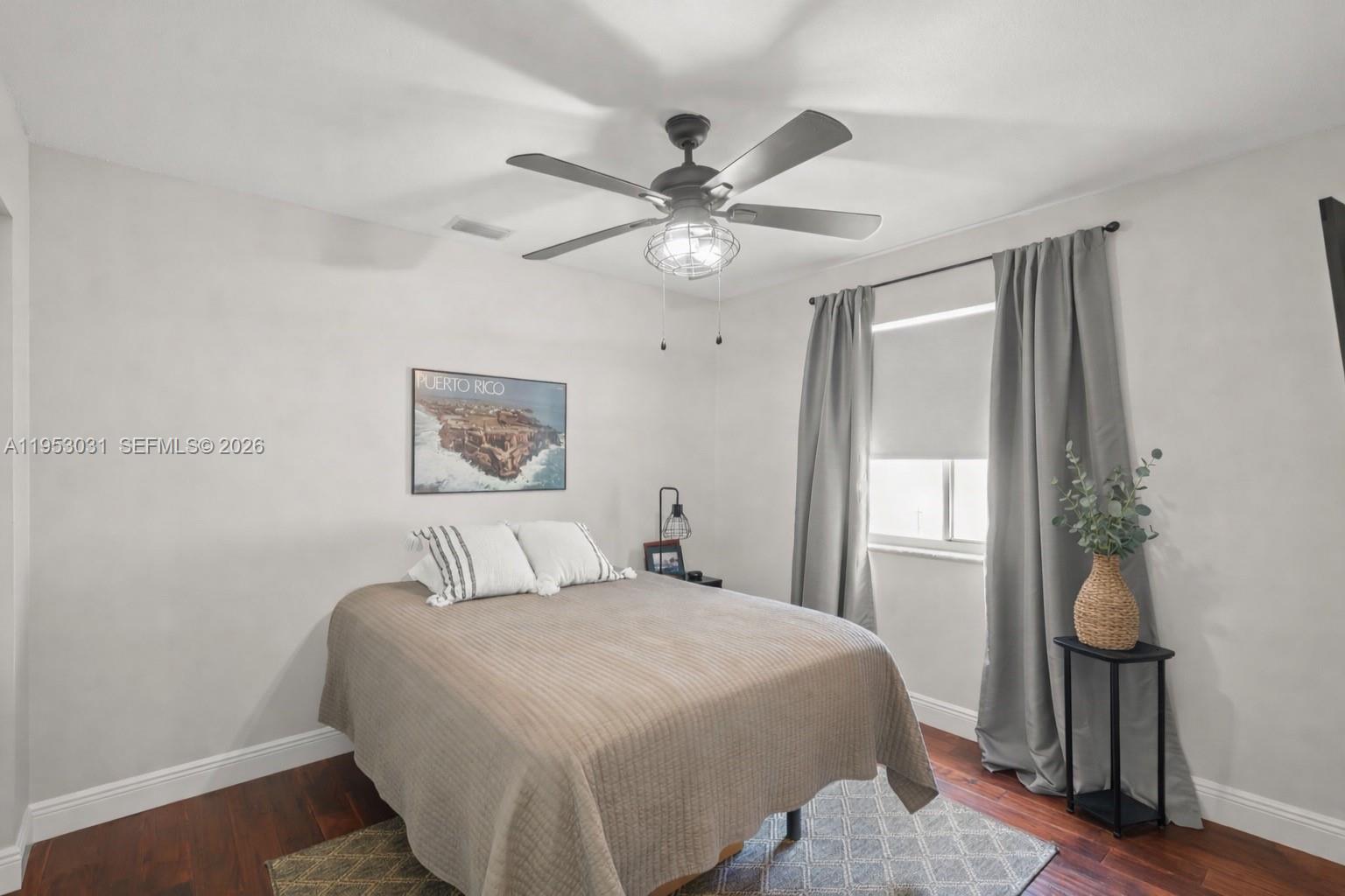 4036 Pine Ridge Lane Weston, FL 33331 - Photo 5 of 19 a bedroom with a bed and a window