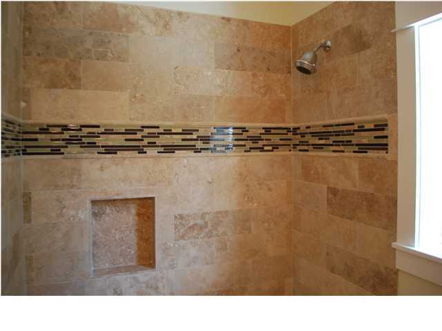 153 Matt's Way Santa Rosa Beach, FL 32459 - Photo 14 of 29 a bathroom with a sink and a mirror