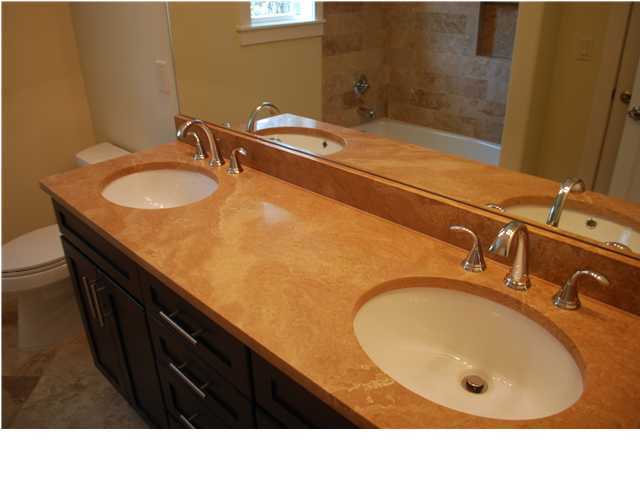 153 Matt's Way Santa Rosa Beach, FL 32459 - Photo 15 of 29 a bathroom with a sink and a mirror