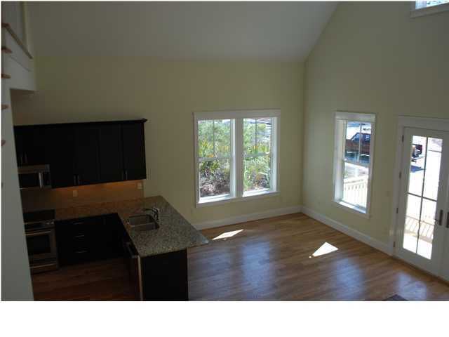 153 Matt's Way Santa Rosa Beach, FL 32459 - Photo 19 of 29 a living room with furniture window and wooden floor