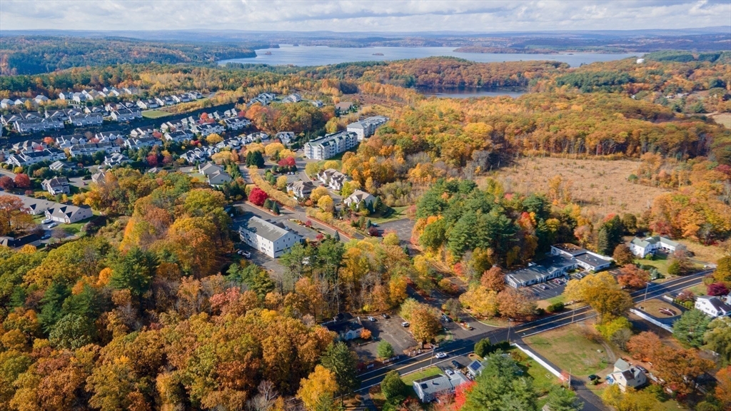 449 Berlin Street Clinton, MA 01510 - Photo 2 of 7 an aerial view of residential building and trees around