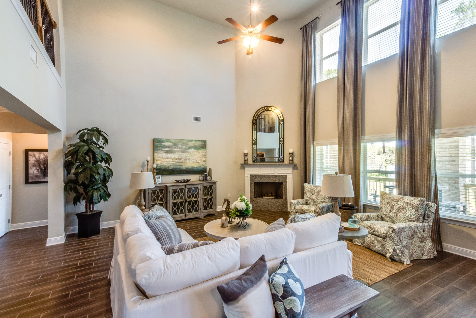 579 Golf Club Drive Santa Rosa Beach, FL 32459 - Photo 11 of 33 a living room with furniture fireplace and a large window