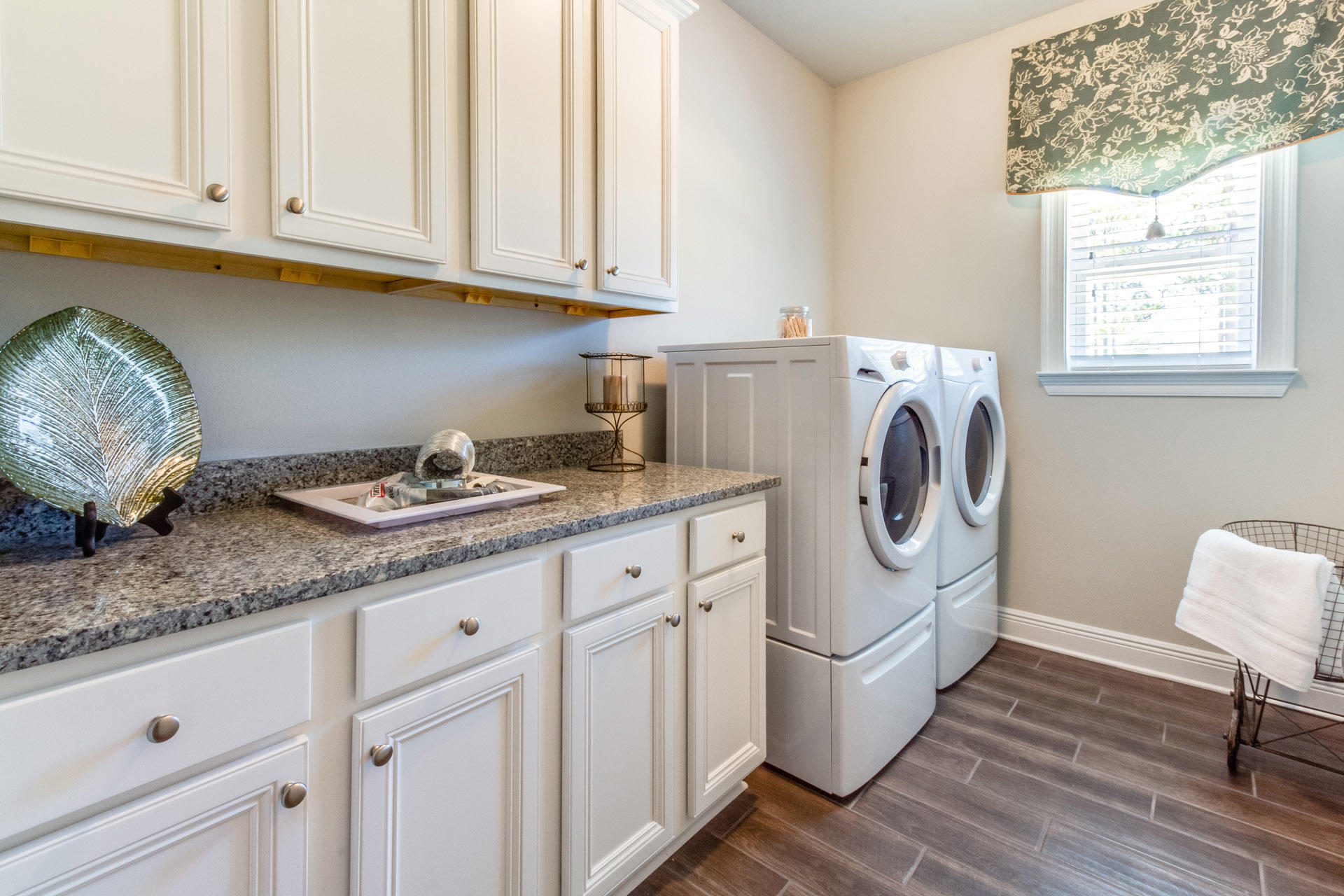 579 Golf Club Drive Santa Rosa Beach, FL 32459 - Photo 17 of 33 a utility room with granite countertop cabinets washer and dryer