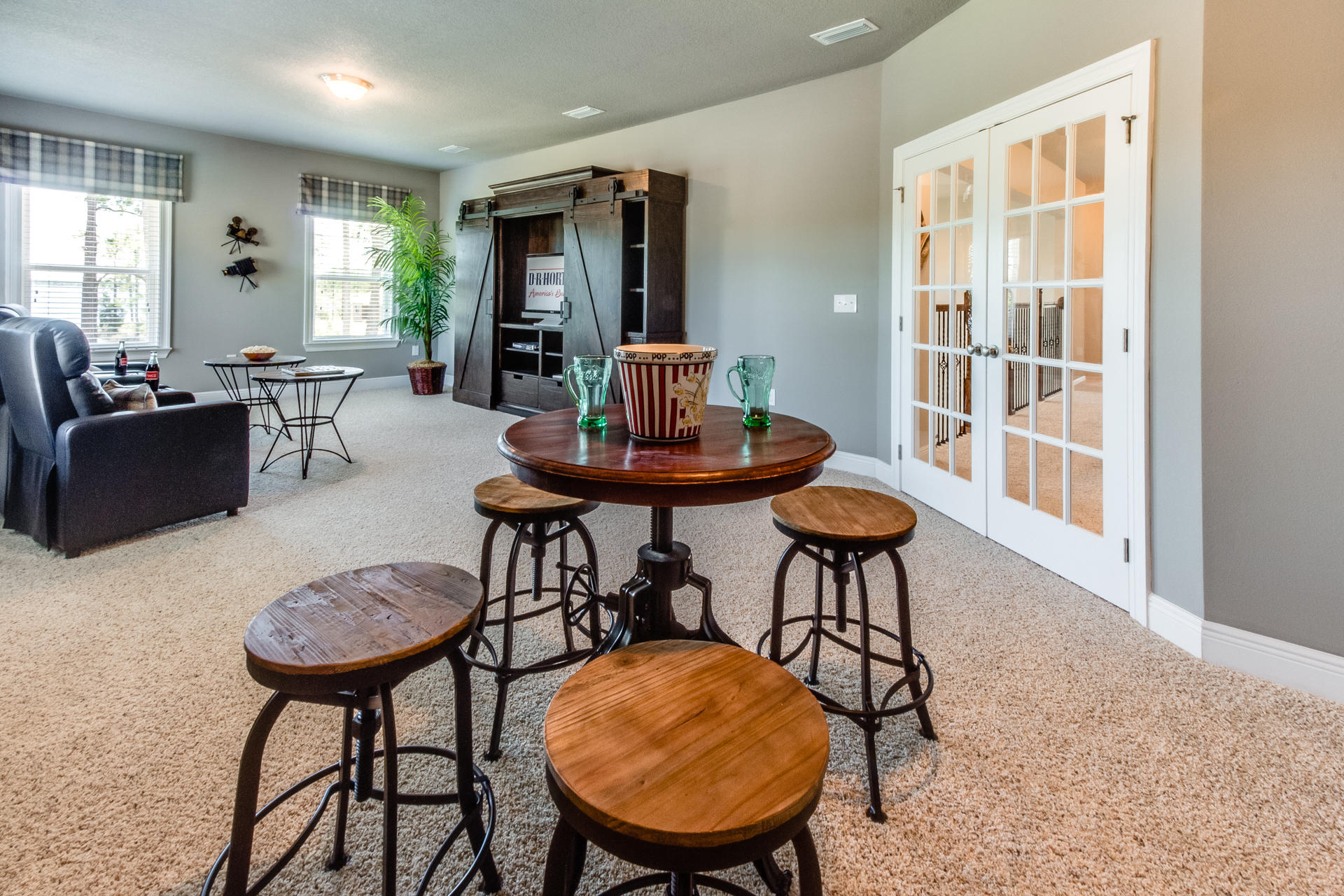 579 Golf Club Drive Santa Rosa Beach, FL 32459 - Photo 25 of 33 a living room with furniture a table and kitchen view