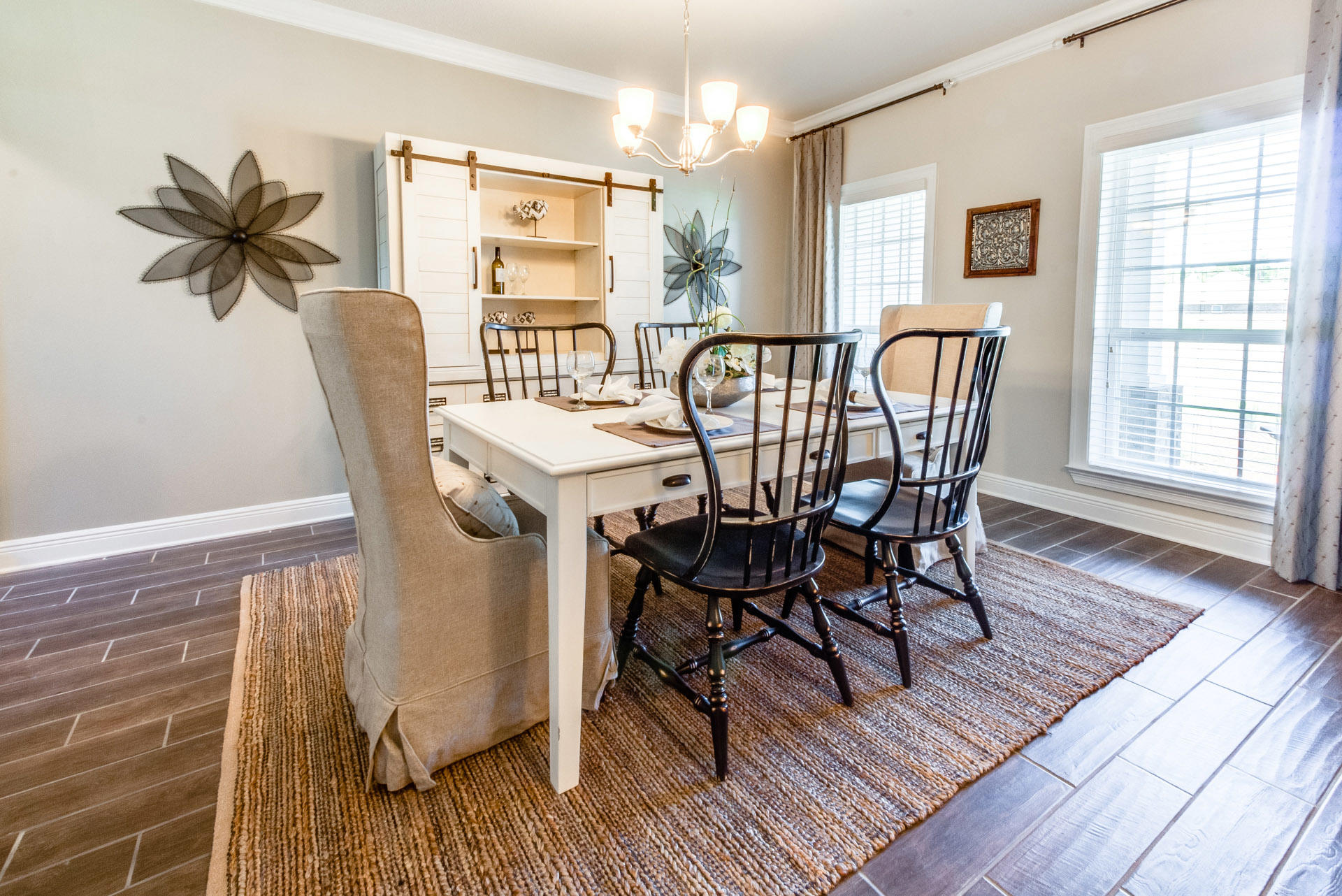 579 Golf Club Drive Santa Rosa Beach, FL 32459 - Photo 9 of 33 a view of a dining room with furniture and wooden floor