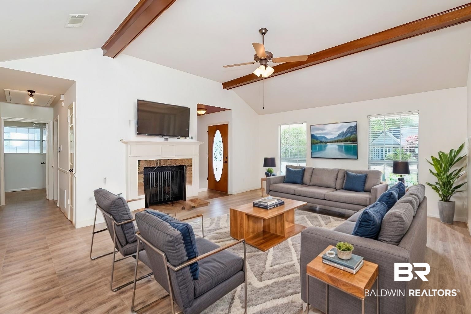 2809 Woodland Road Mobile, AL 36693 - Photo 51 of 52 Virtual Staging. Living room with lofted ceiling with beams, light wood-type flooring, ceiling fan, and a fireplace