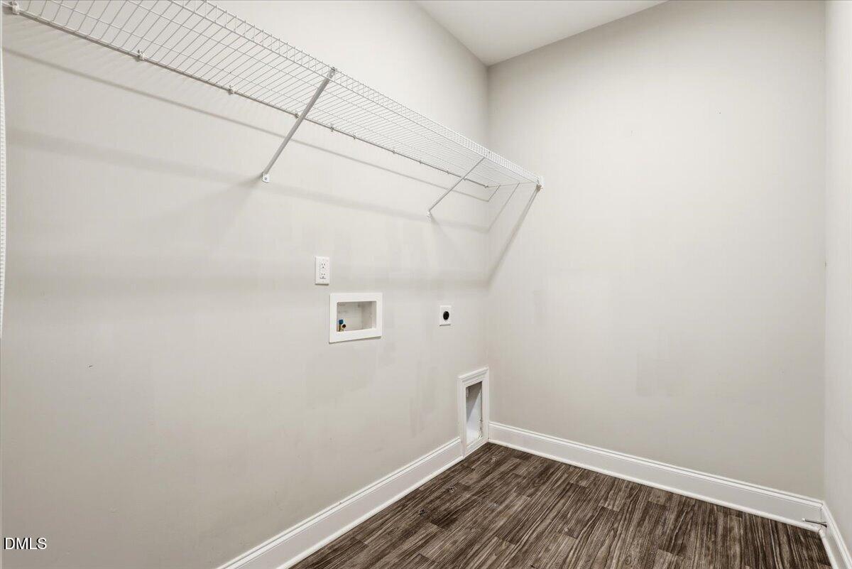 157 Ramsgate Drive Clayton, NC 27520 - Photo 16 of 42 a view of a room with racks on the wall