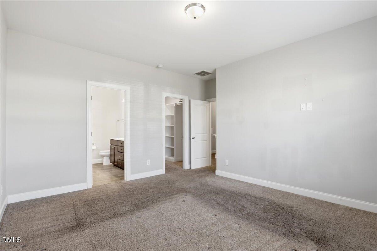 157 Ramsgate Drive Clayton, NC 27520 - Photo 18 of 42 a view of an empty room