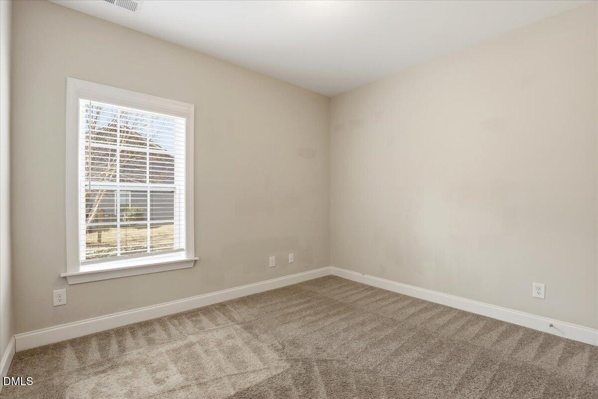 157 Ramsgate Drive Clayton, NC 27520 - Photo 24 of 42 an empty room with a window
