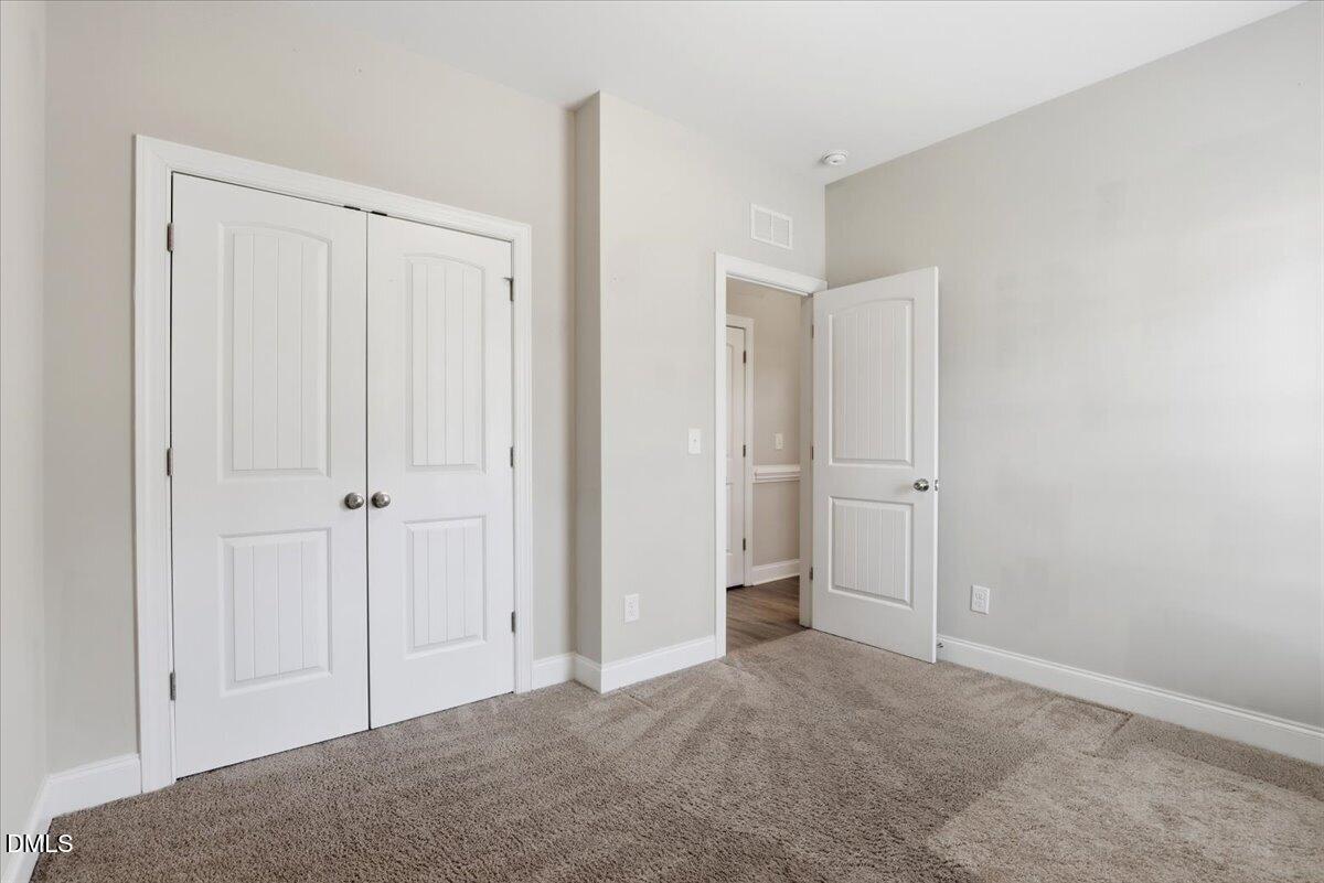 157 Ramsgate Drive Clayton, NC 27520 - Photo 25 of 42 a view of an empty room