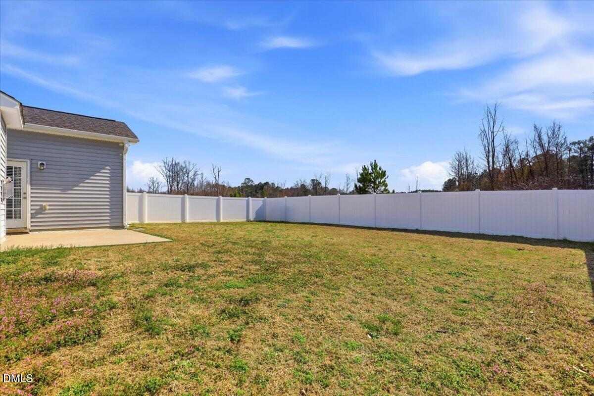157 Ramsgate Drive Clayton, NC 27520 - Photo 36 of 42 a bathroom with a sink and a yard