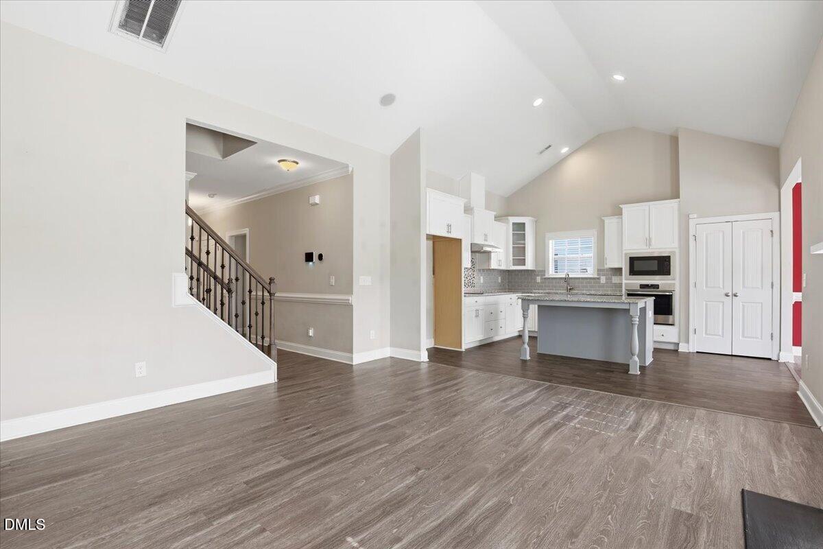 157 Ramsgate Drive Clayton, NC 27520 - Photo 6 of 42 a view of kitchen view wooden floor and electronic appliances