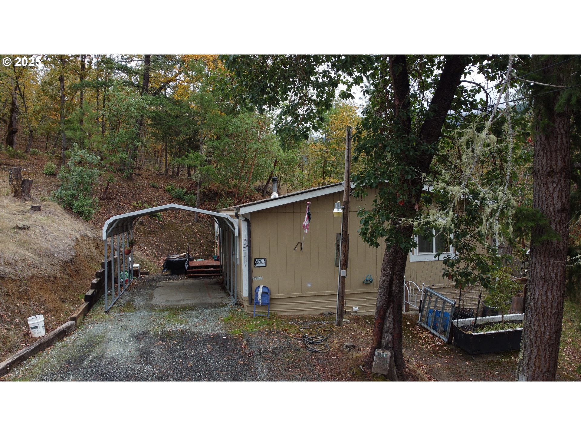 2263 Canyonville-Riddle Road Riddle, OR 97469 - Photo 2 of 36 a black and white photo of a house