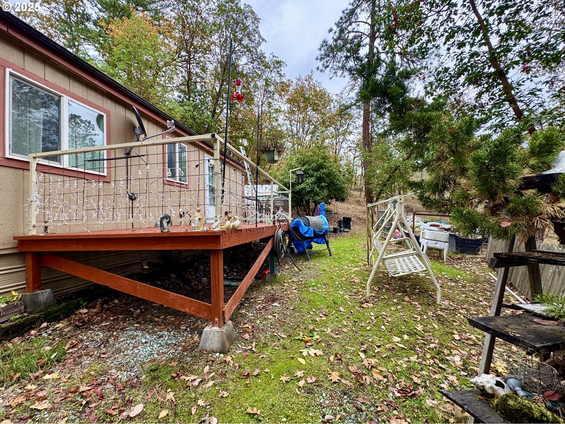 2263 Canyonville-Riddle Road Riddle, OR 97469 - Photo 23 of 36 a view of house with backyard space and sitting area