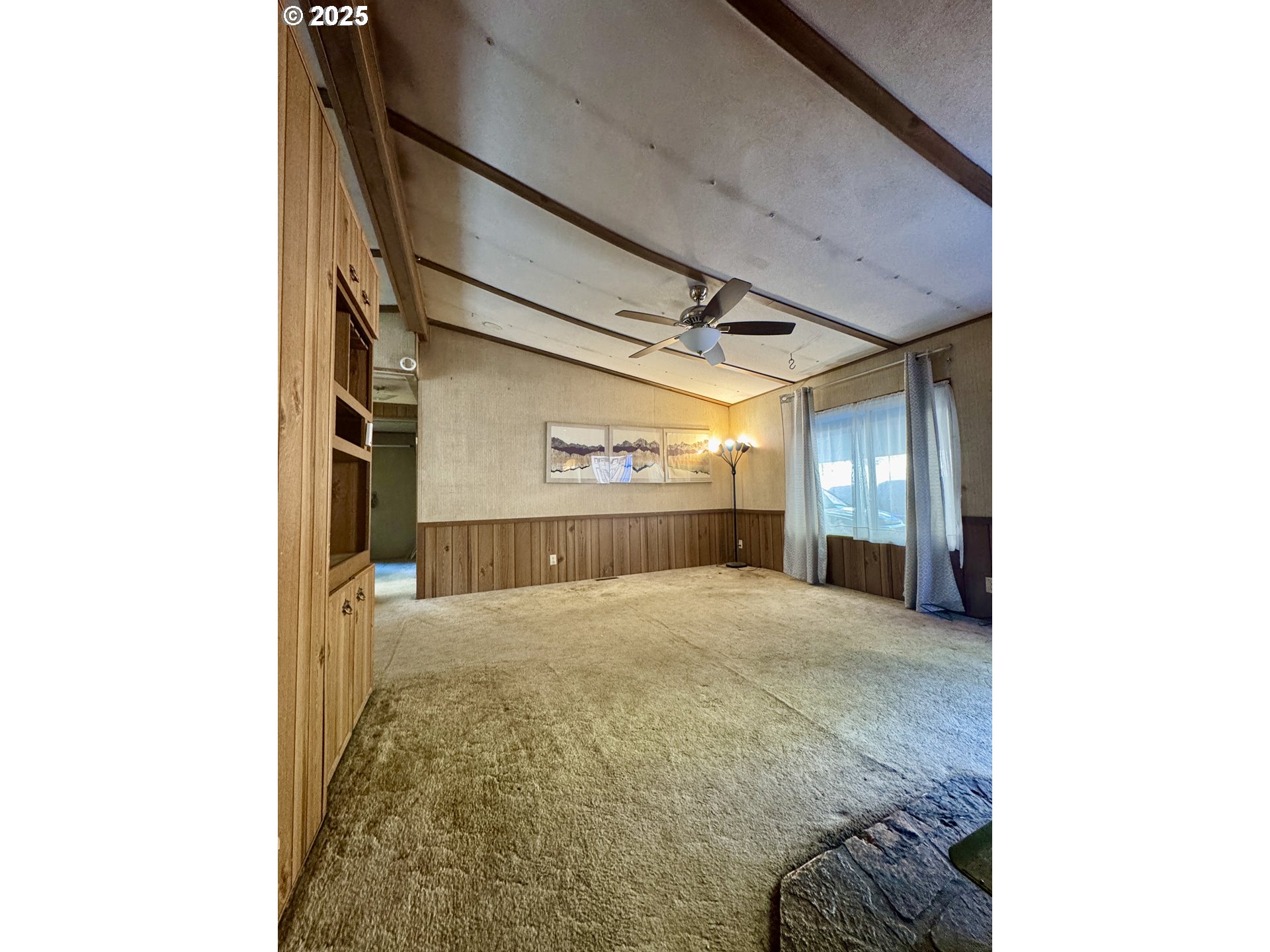 2263 Canyonville-Riddle Road Riddle, OR 97469 - Photo 5 of 36 a view of a hallway with wooden floor
