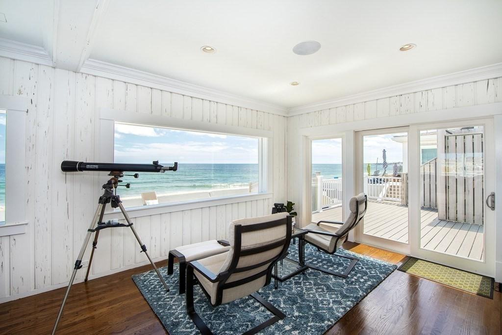 43 Surfside Road Scituate, MA 02066 - Photo 16 of 40 a living room with furniture and a wooden floor