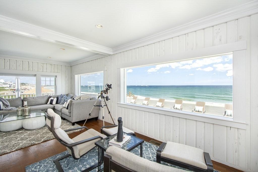 43 Surfside Road Scituate, MA 02066 - Photo 17 of 40 a living room with furniture and a large window