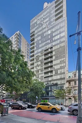 237 East 34th Street, Unit 706 Manhattan, NY 10016 - Photo 22 of 25 a cars parked in front of a building