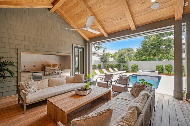a view of a kitchen with sink washer and dryer