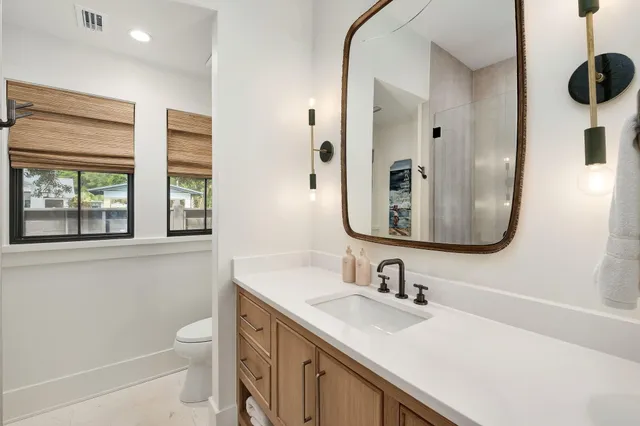 a bedroom with a bed and furniture