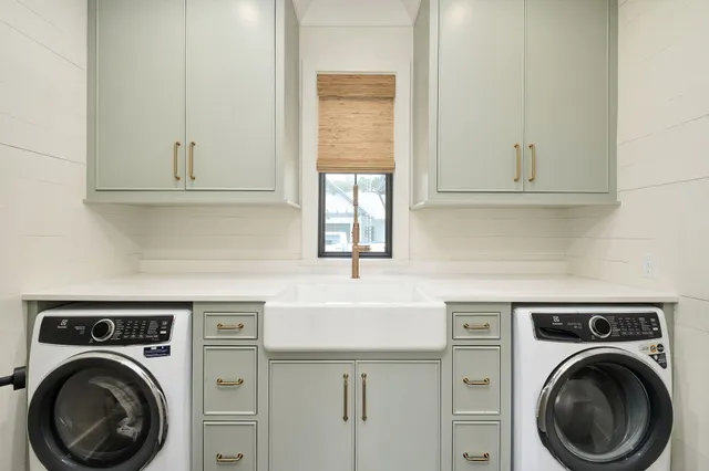 a view of a house with swimming pool and sitting area