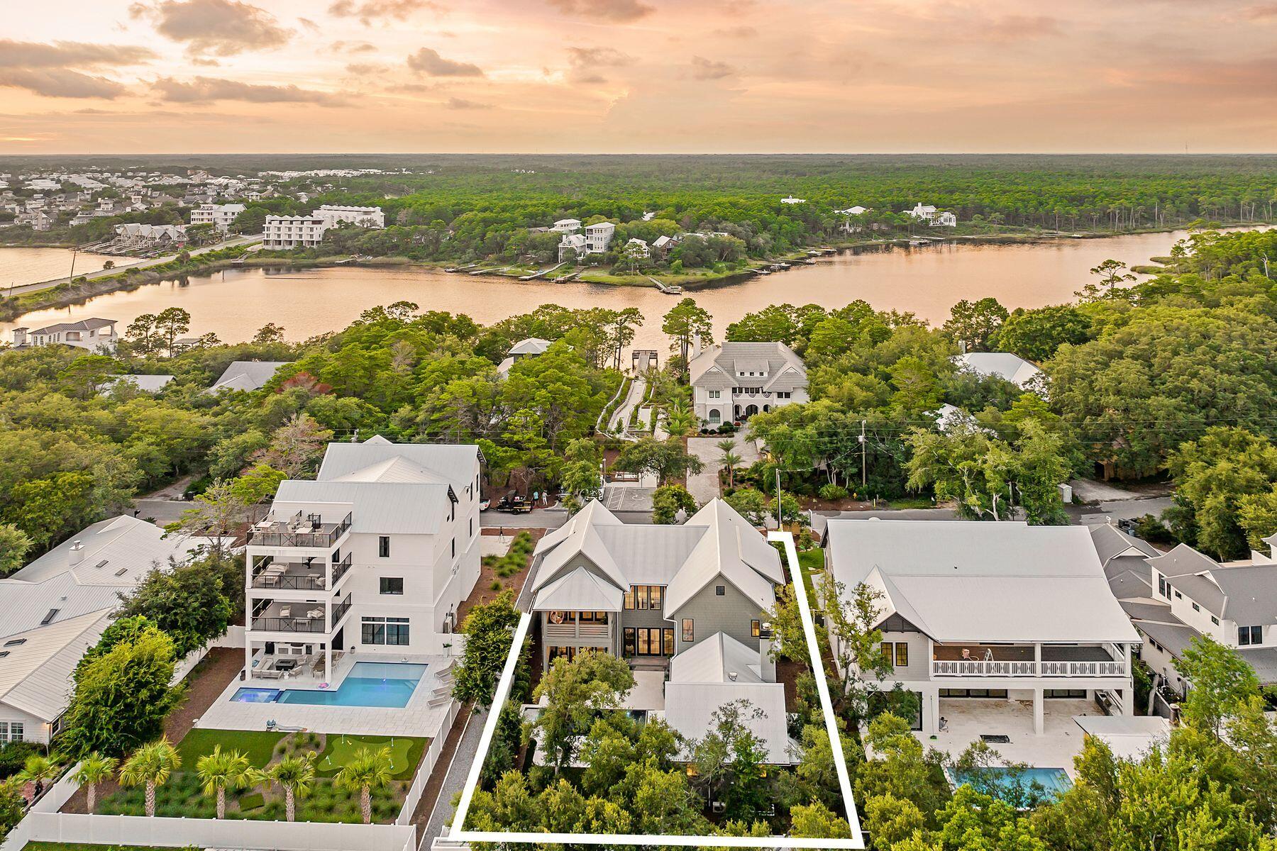 122 Camp Creek Road South Inlet Beach, FL 32461 - Photo 62 of 75 an aerial view of a house with garden space and ocean view