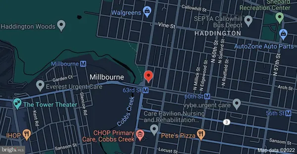 a view of a door with a small car park